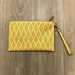 Yellow clutch bag